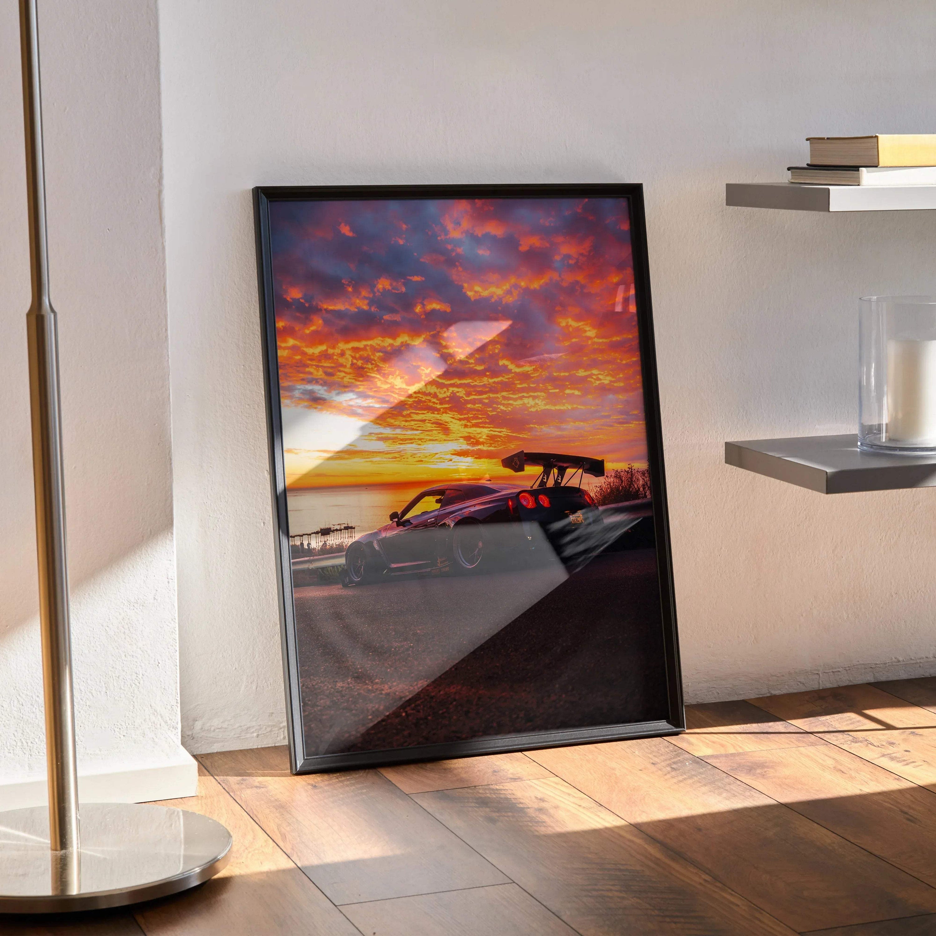 Nissan GT-R R35 widebody parked at sunset vibrant sky poster wall art in black frame.