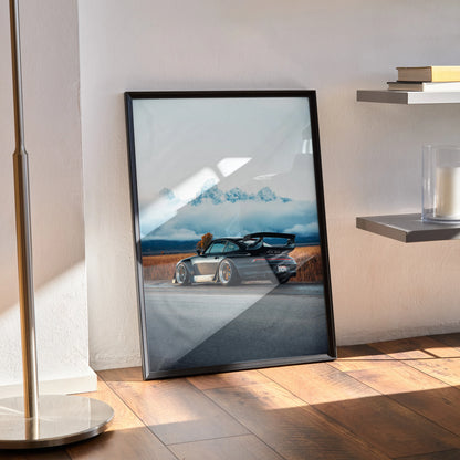 RWB Porsche 911 car poster with high resolution wall art in black frame leaning on floor.