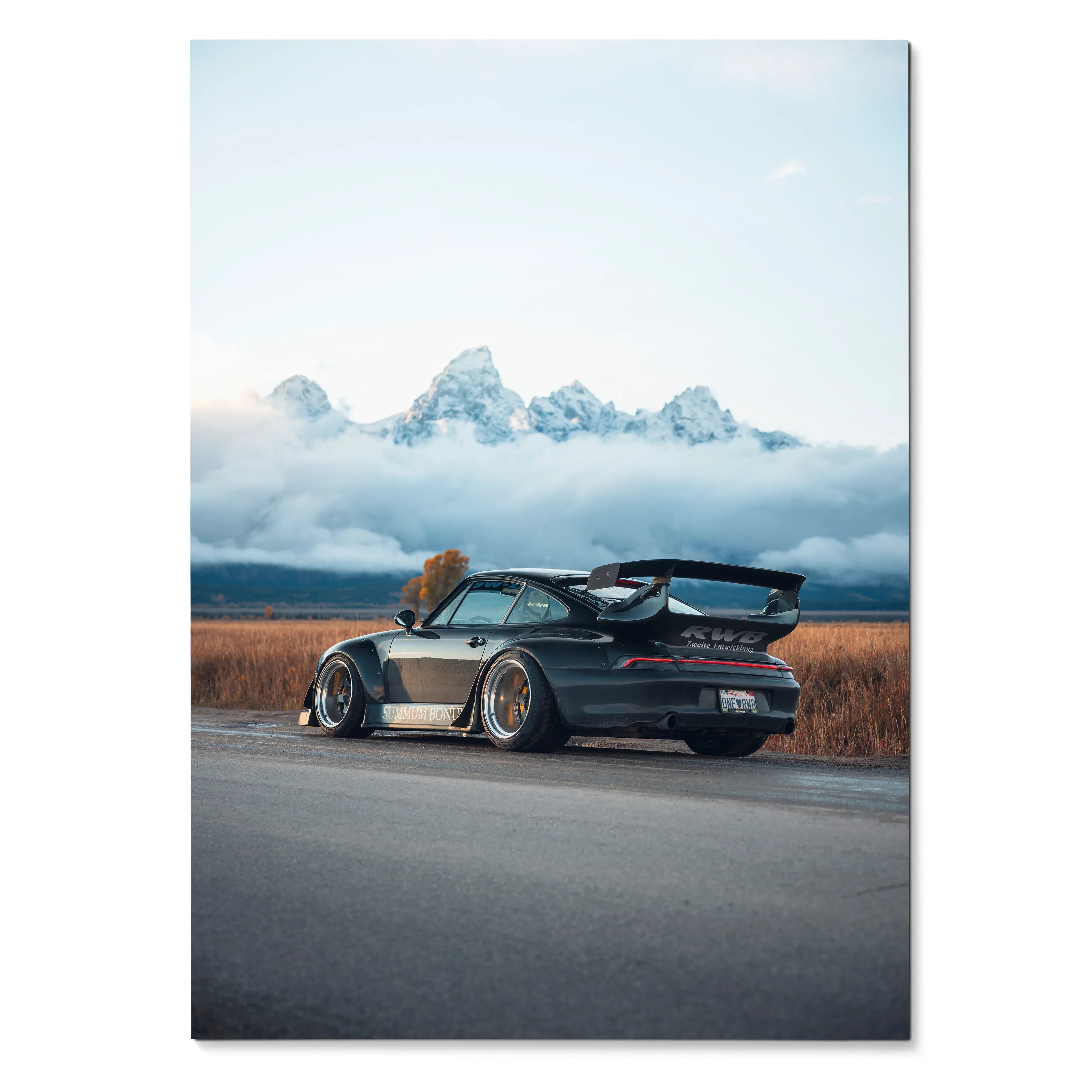 RWB Porsche 911 parked on road with mountainous landscape background poster wall art.