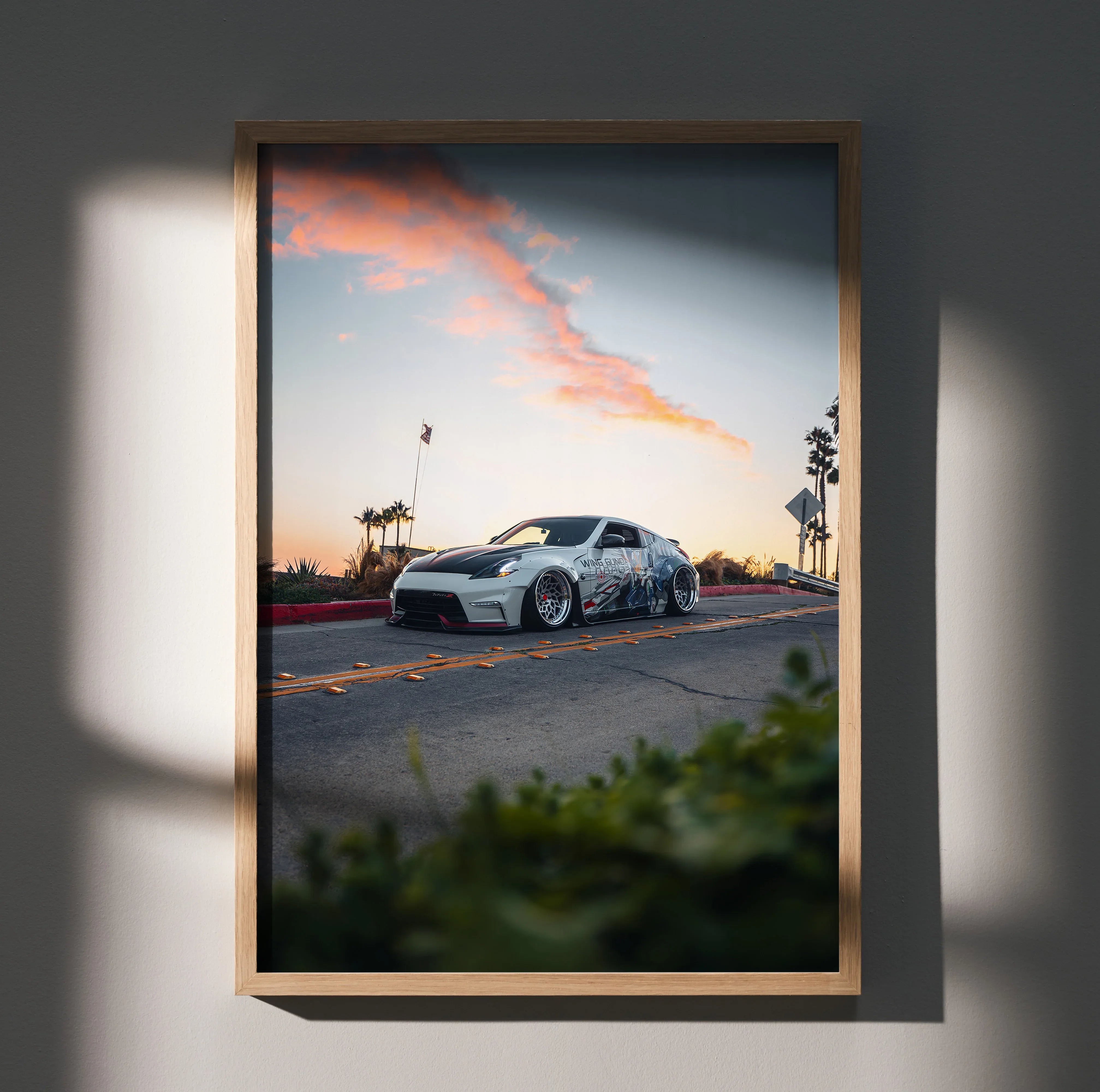 Nissan 370z JDM widebody car on road sunset wall art poster with vibrant sky colors.