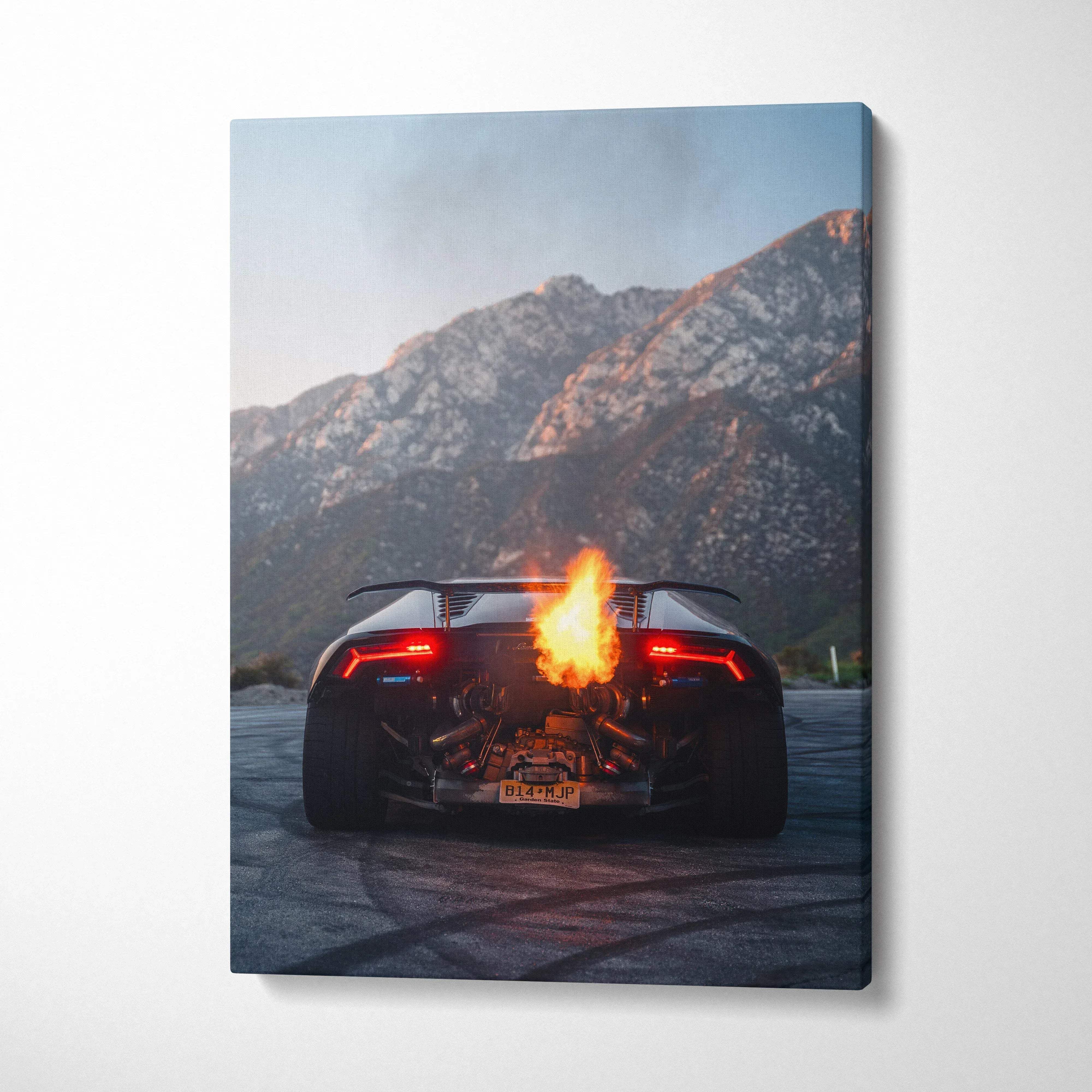 Lamborghini Huracan canvas art with fiery exhaust against mountain backdrop, vertical wall art.