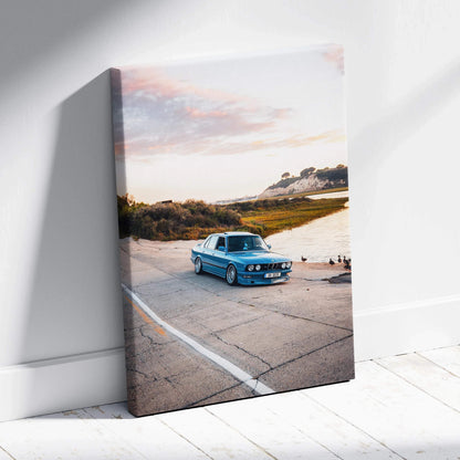 BMW E28 5 Series vintage car on coastal road vertical canvas wall art print.