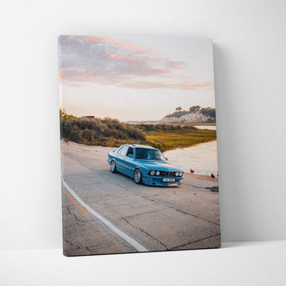 BMW E28 5 Series vintage car on road at sunset canvas art wall decor.