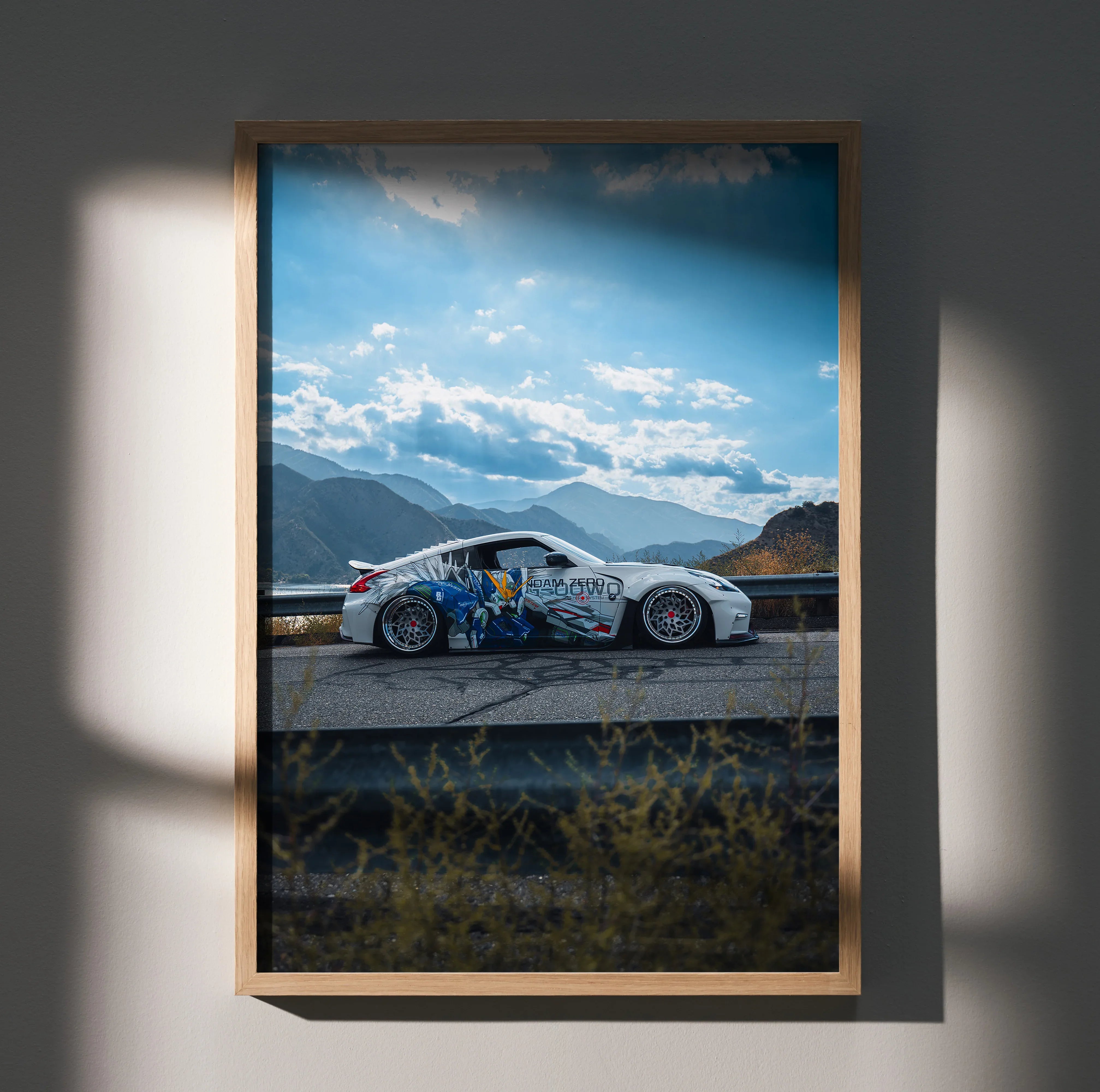 Nissan 370z widebody JDM car poster wall art with mountain backdrop in wood frame.