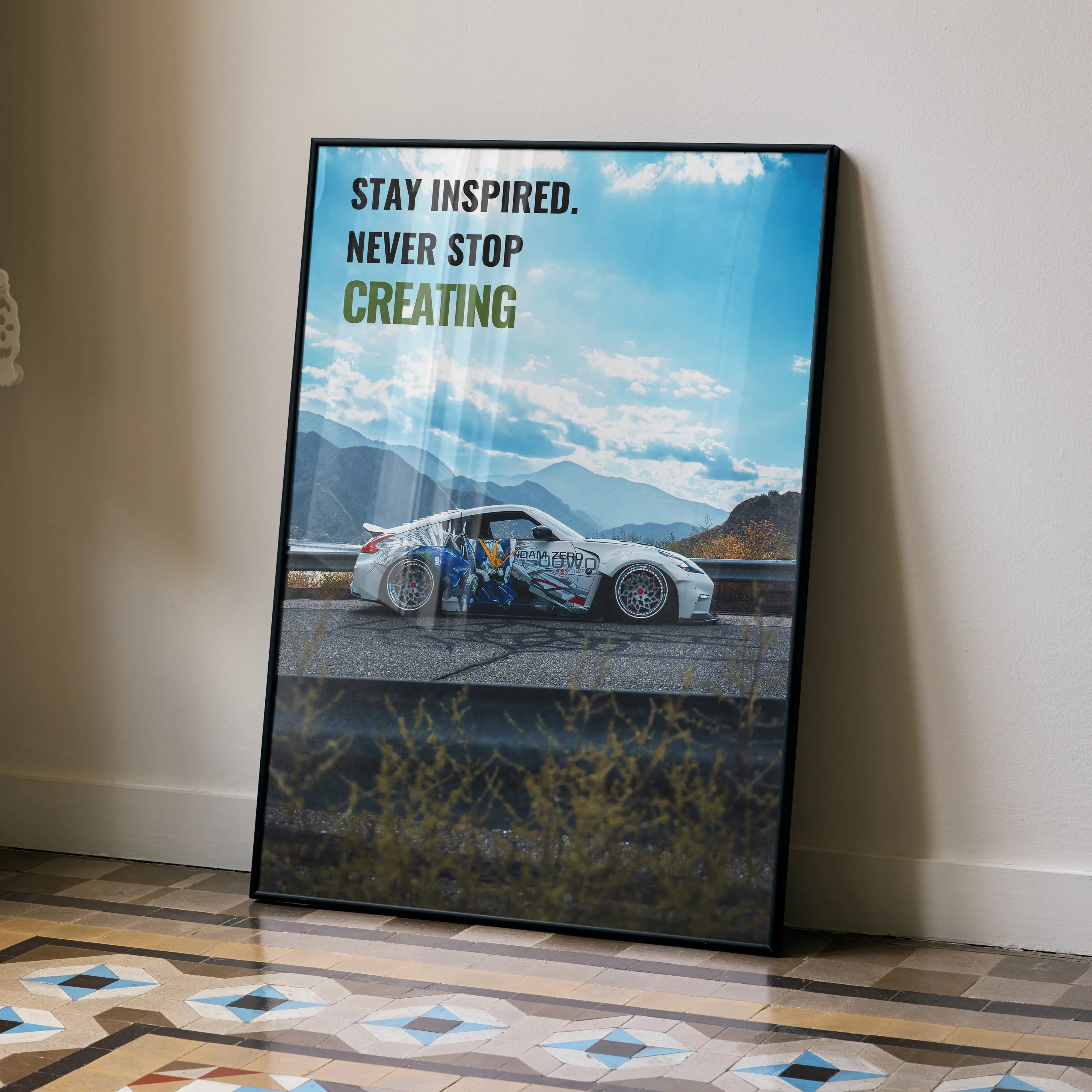 Motivational poster wall art featuring Nissan 370z on mountain road with inspiring text.