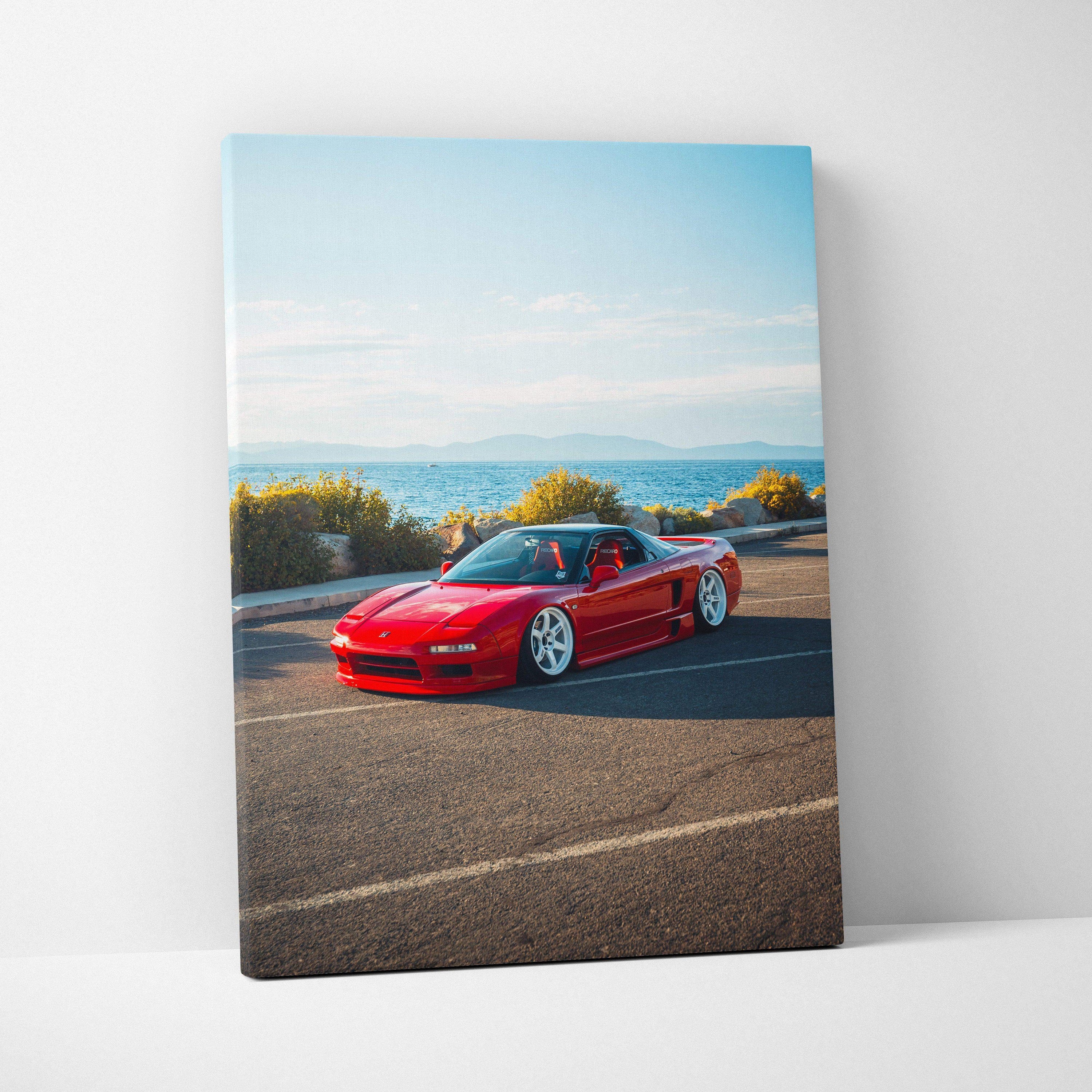 Red Acura NSX sports car on asphalt with mountains in background on vertical canvas wall art.