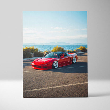 Red Acura NSX sports car on coastal road canvas wall art with blue sky background.