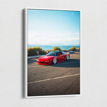Red Acura NSX sports car on road with mountains under blue sky, vertical canvas wall art.