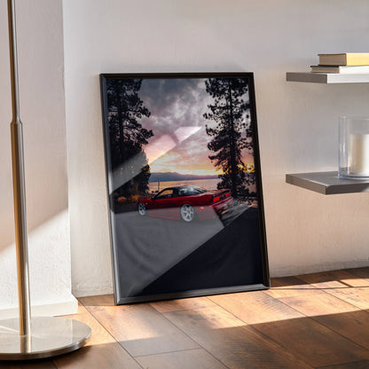 Acura NSX JDM red sports car poster with sunset and trees in black frame leaning on floor wall art.