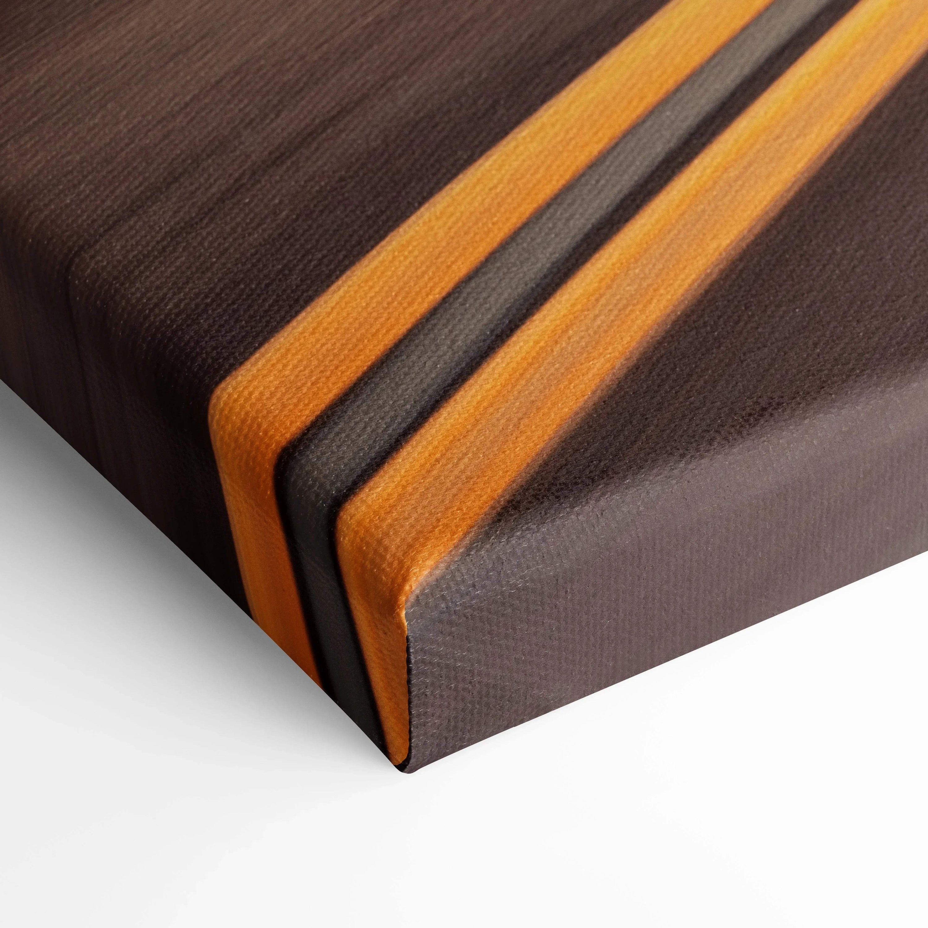 Close-up of corner on vertical Lamborghini Aventador SVJ canvas art with orange and black stripes on dark background wall art.