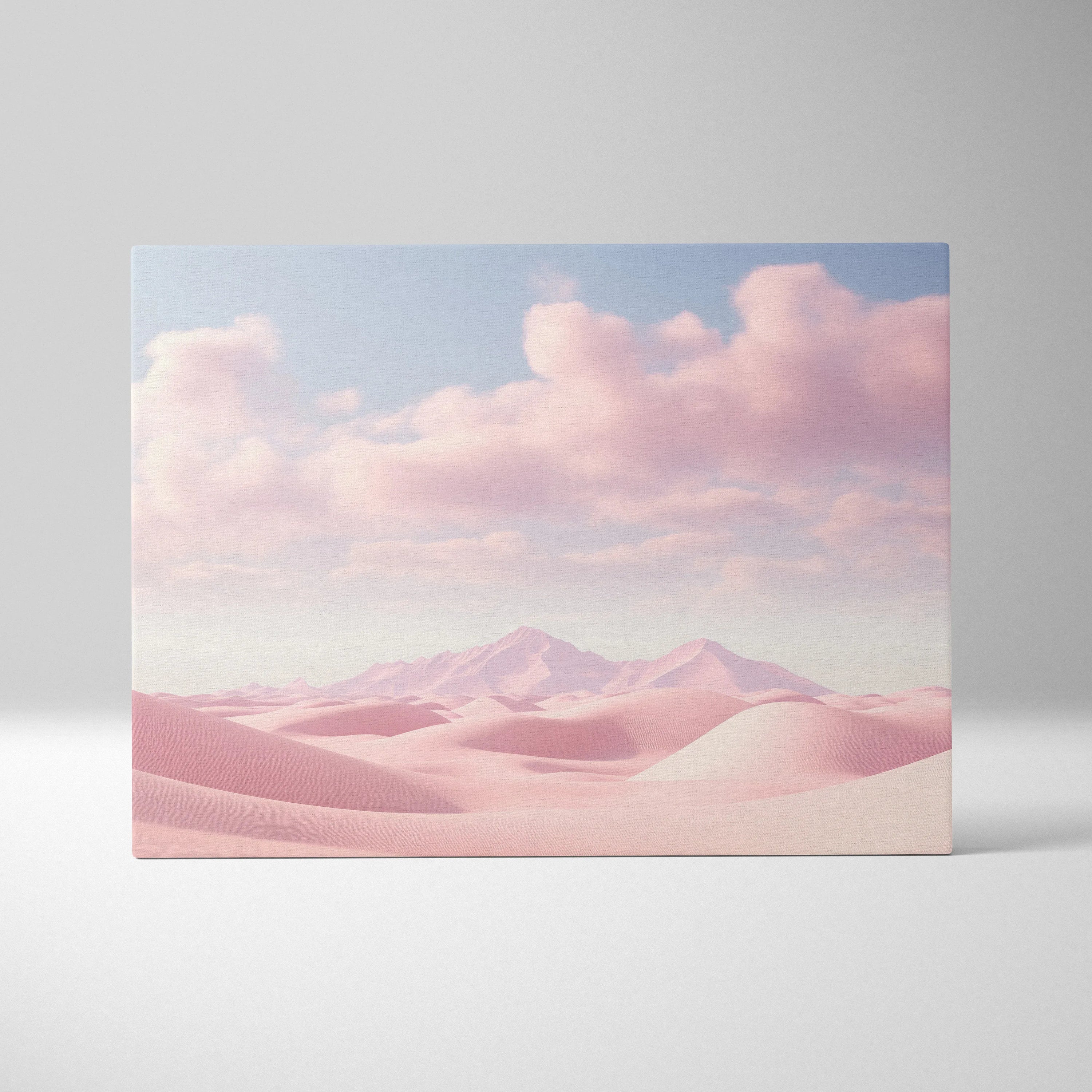 Canvas wall art depicting minimalist pink desert dunes under soft pink clouds, modern decor print.