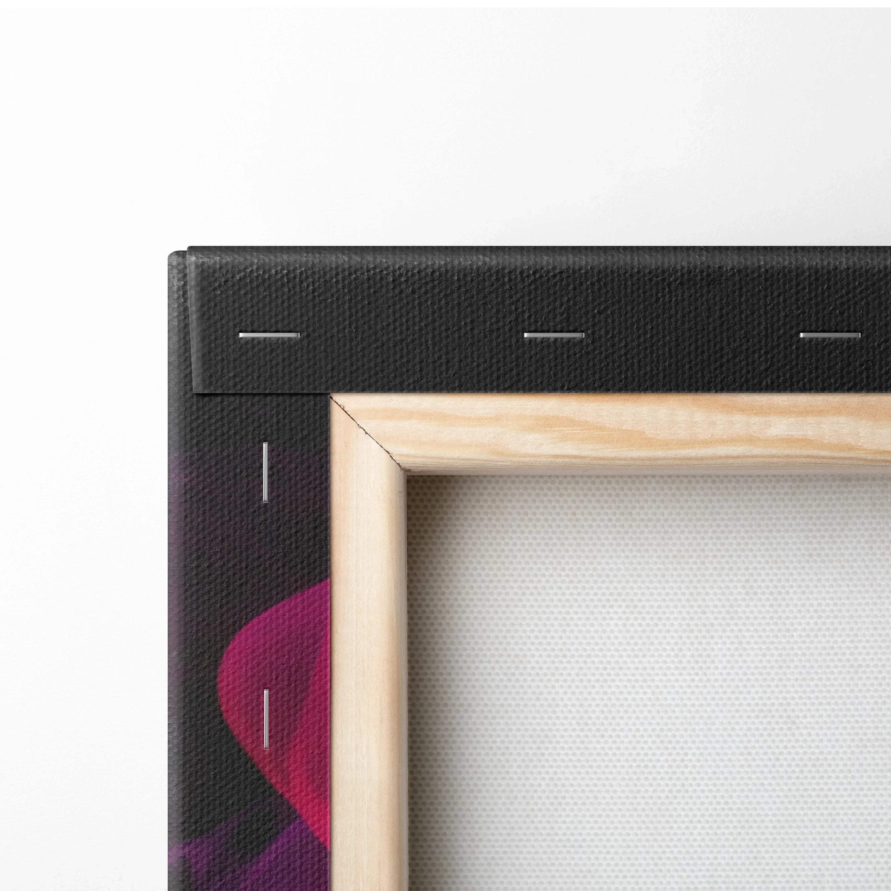 Close-up of wooden frame edge and black stapled canvas back of vibrant abstract digital art canvas wall art.