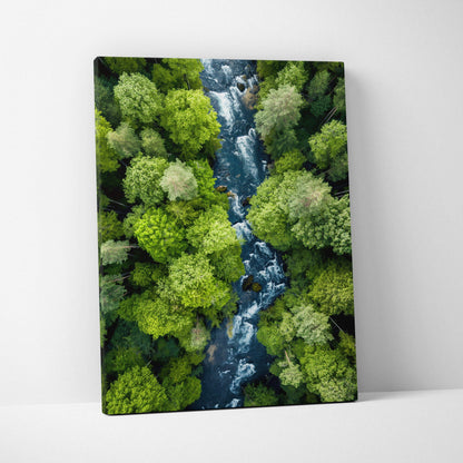 Vertical canvas wall art featuring a serene river flowing through lush green forest decor.