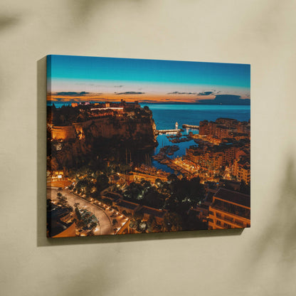 Canvas wall art featuring a vibrant nighttime cityscape with illuminated buildings and a coastal view.