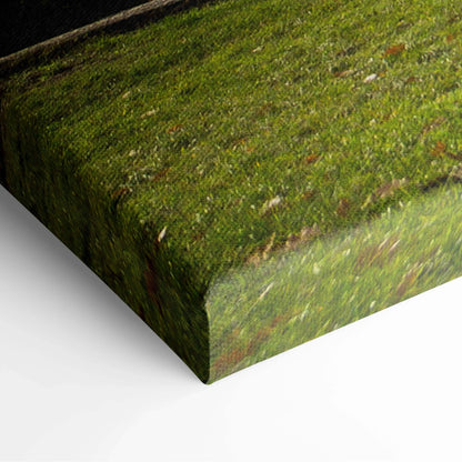 Close-up of textured canvas art with green and brown architectural landscape design on wall art canvas wrap.