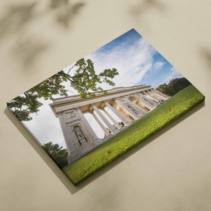 Canvas wall art featuring a classical building with tall white columns against a blue sky and green grass foreground.
