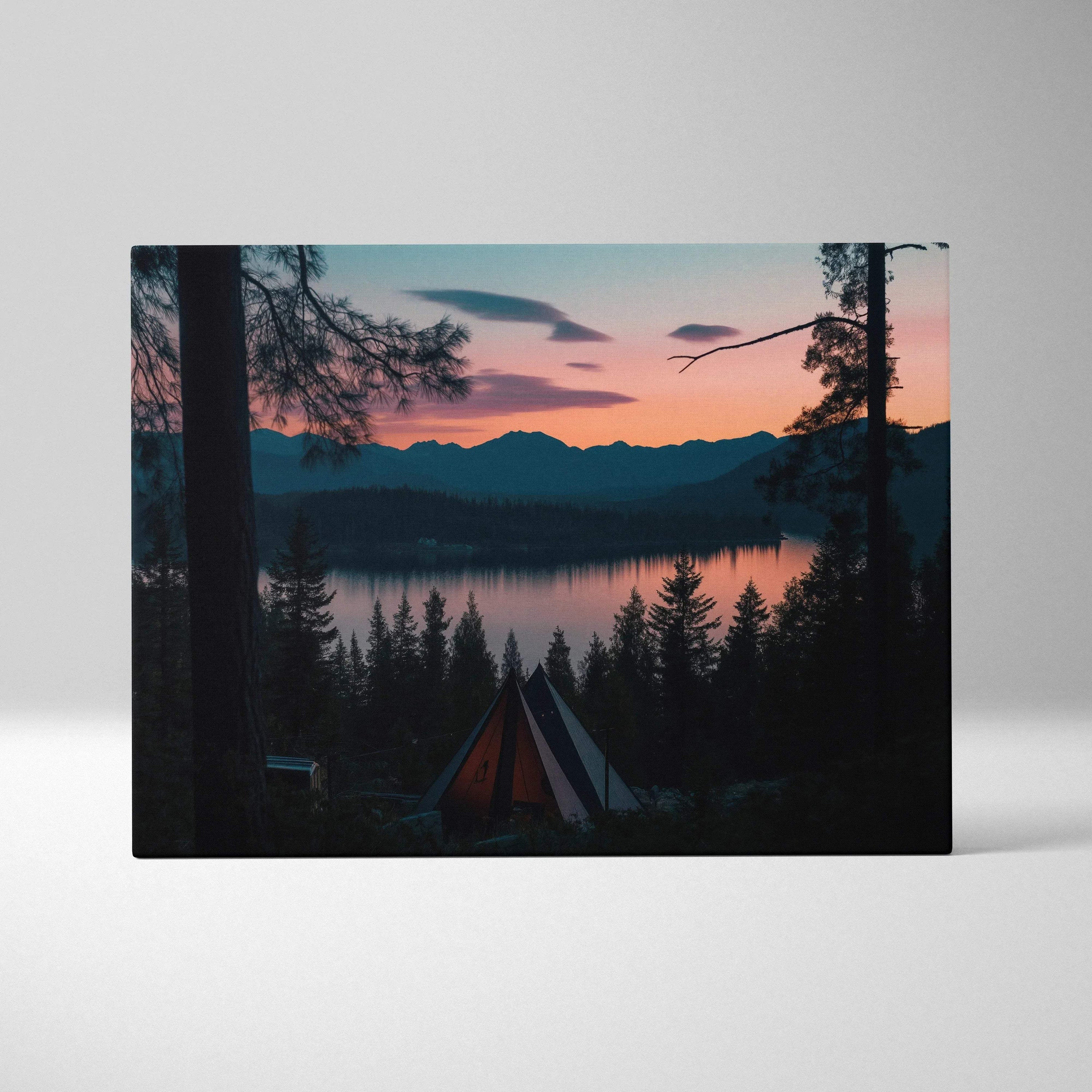 Canvas wall art featuring a serene forest sunset with mountain silhouette and lake reflection for decor.