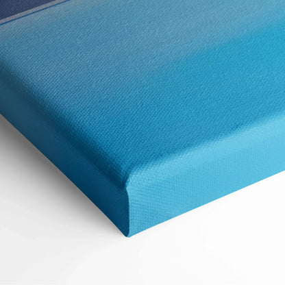 Close-up of vibrant blue stretched canvas wall art with textured surface and wrapped edges.