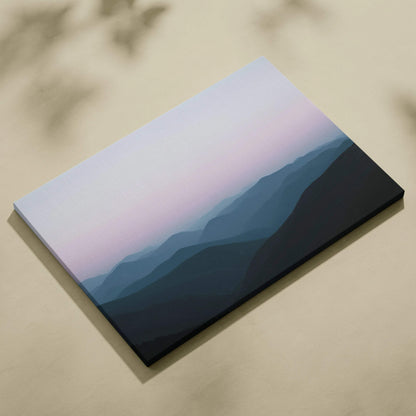 Canvas print of atmospheric foggy mountain landscape in soft pink blue gradient
