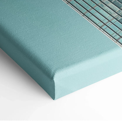 Light blue canvas wall art with minimalist skyscraper building design and clean lines.