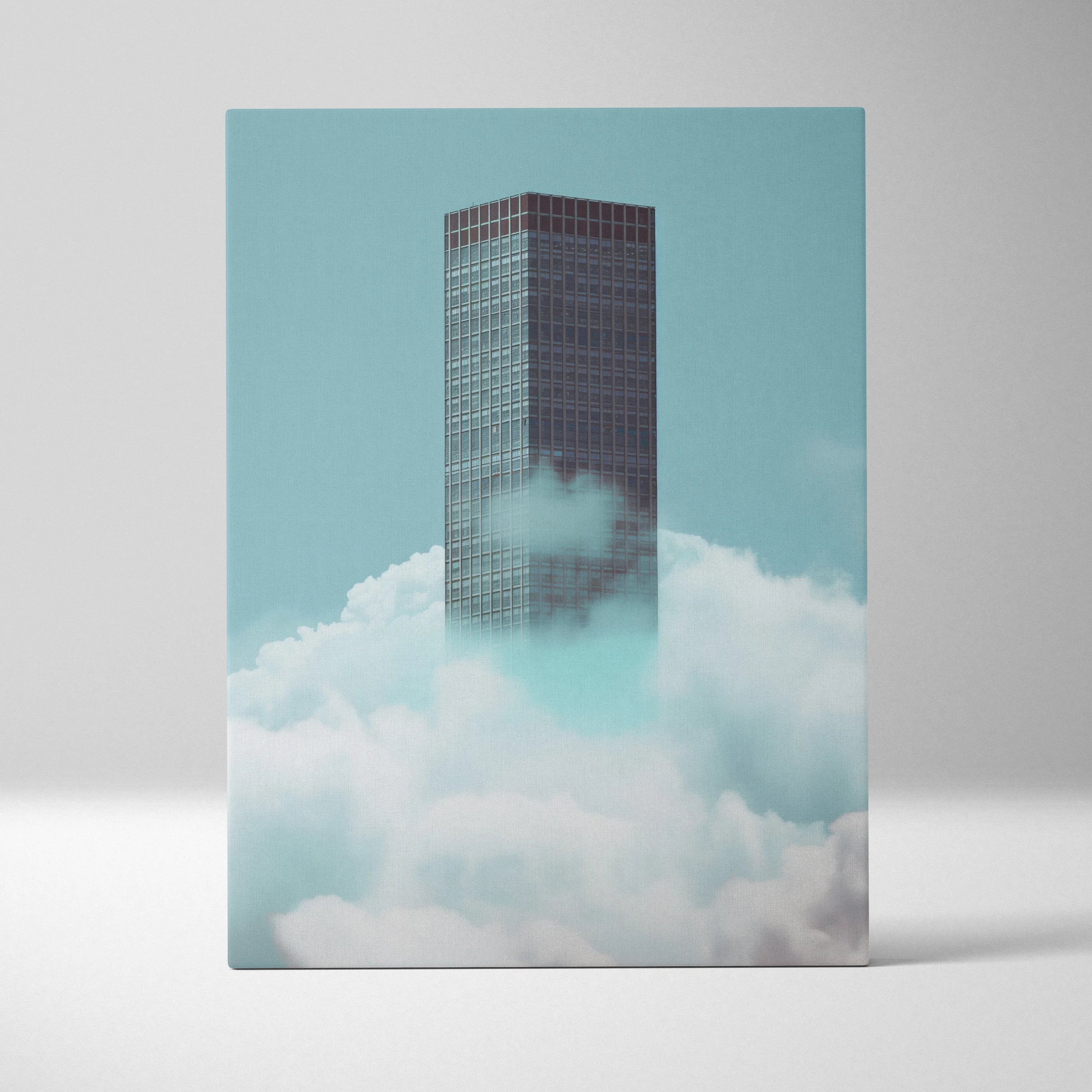 Minimalist skyscraper rising through soft clouds with blue sky background canvas wall art.
