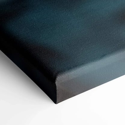 Black stretched canvas corner with textured surface and sharp, clean edges.