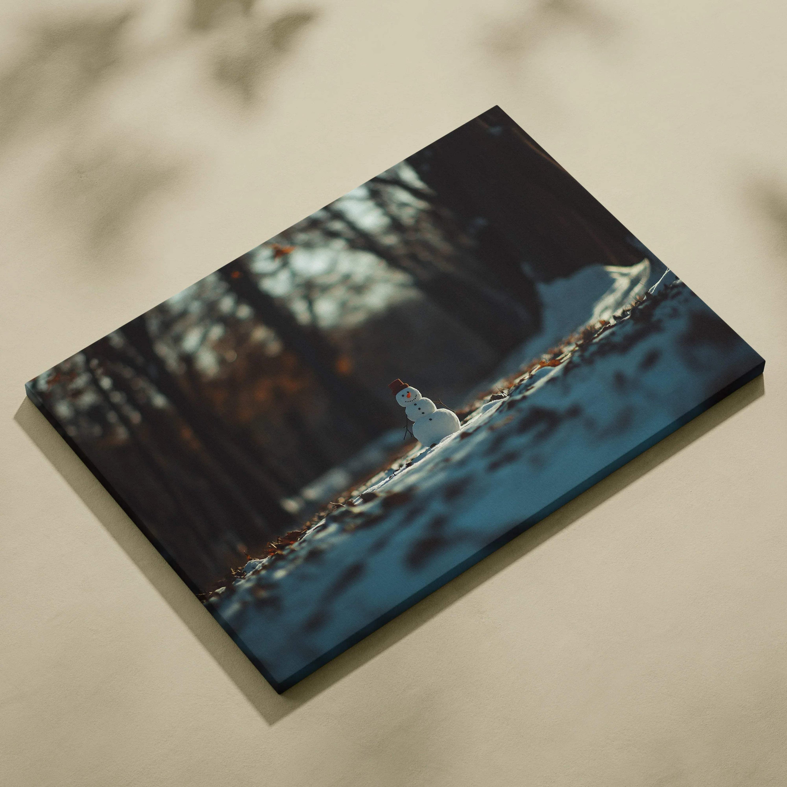 Cozy winter snowman canvas wall art with forest background and soft natural light decor.