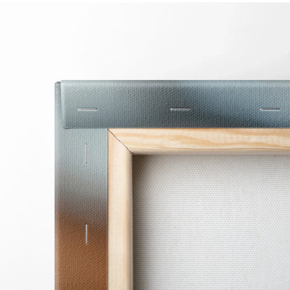 Close-up of wooden frame and stapled gray canvas backing for wall art decor.