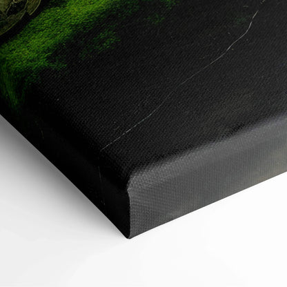 Close-up of black canvas corner with textured surface, showing subtle green moss detail in wall art decor.