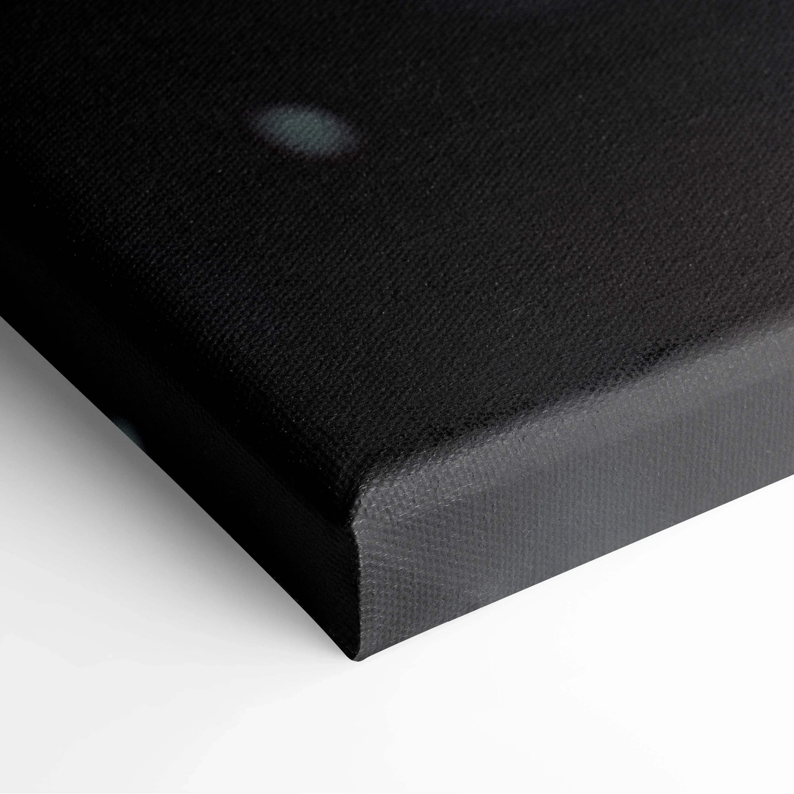 Black stretched canvas panel with visible fabric texture and clean folded corners for wall art decor.