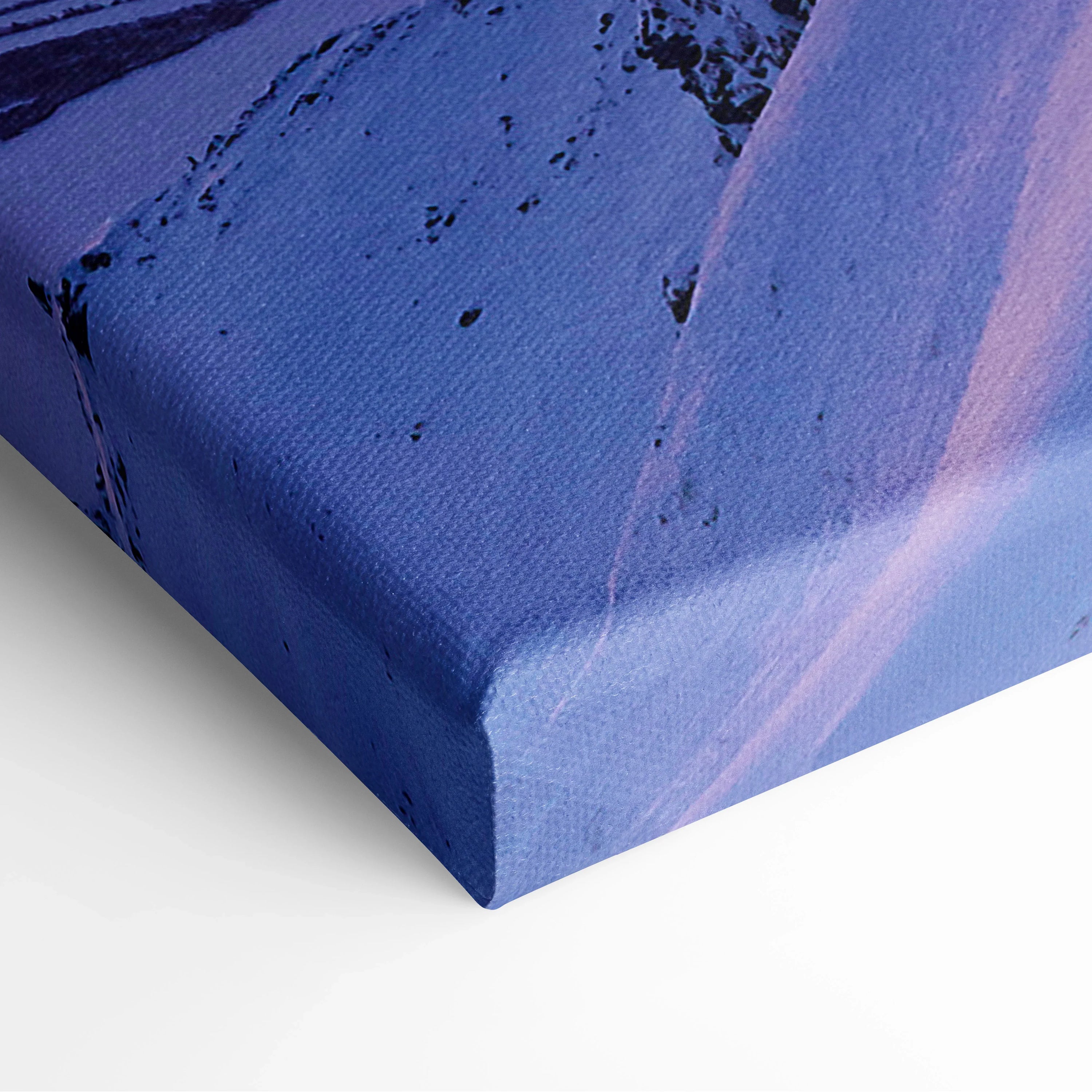 Canvas wall art featuring a snowy mountain peak at sunset with soft purple and orange hues.