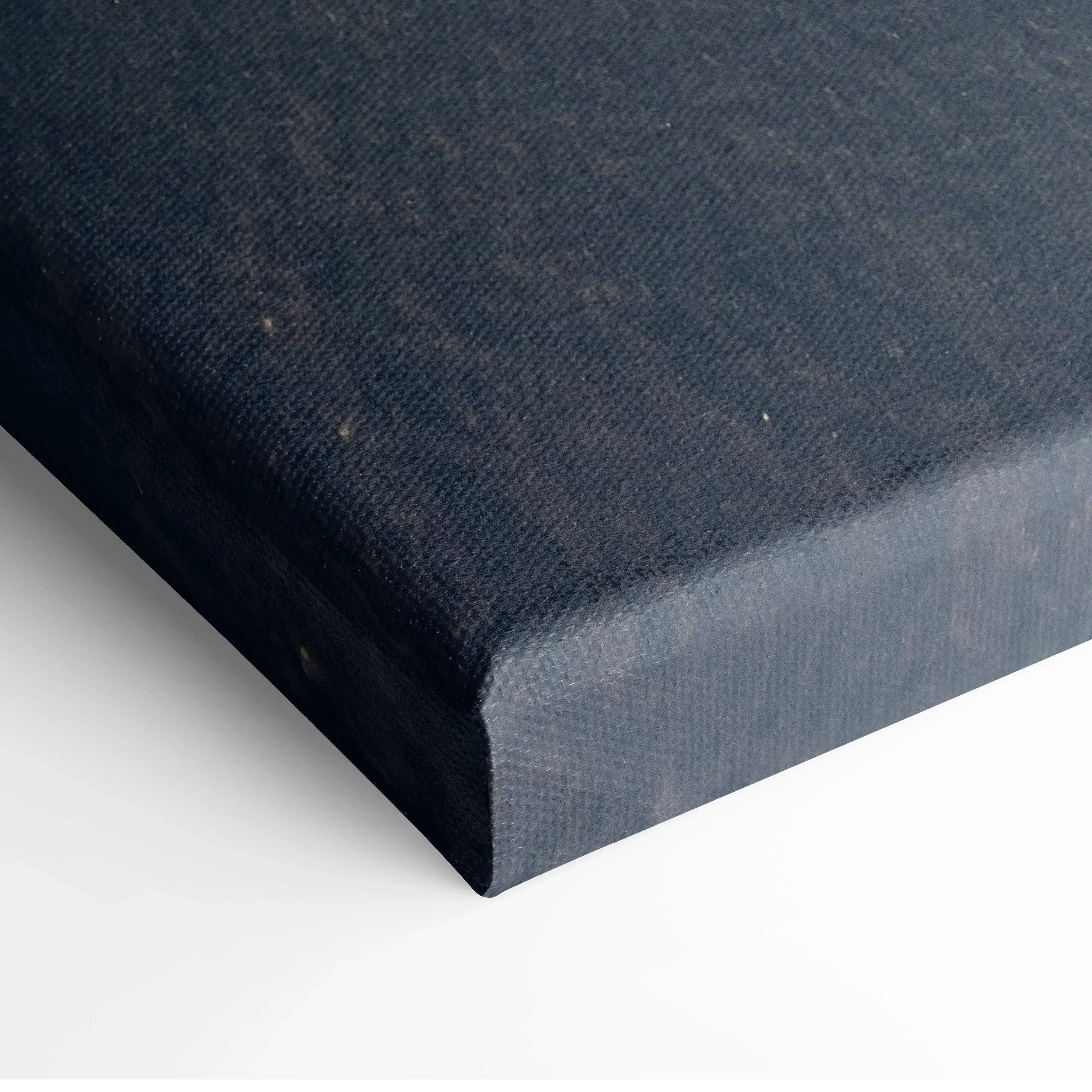 Black canvas art panel with textured woven surface and raised edges featuring serene snowy norwegian mountains sunrise