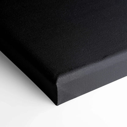 Black edge close-up of stretched canvas wall art with textured surface.