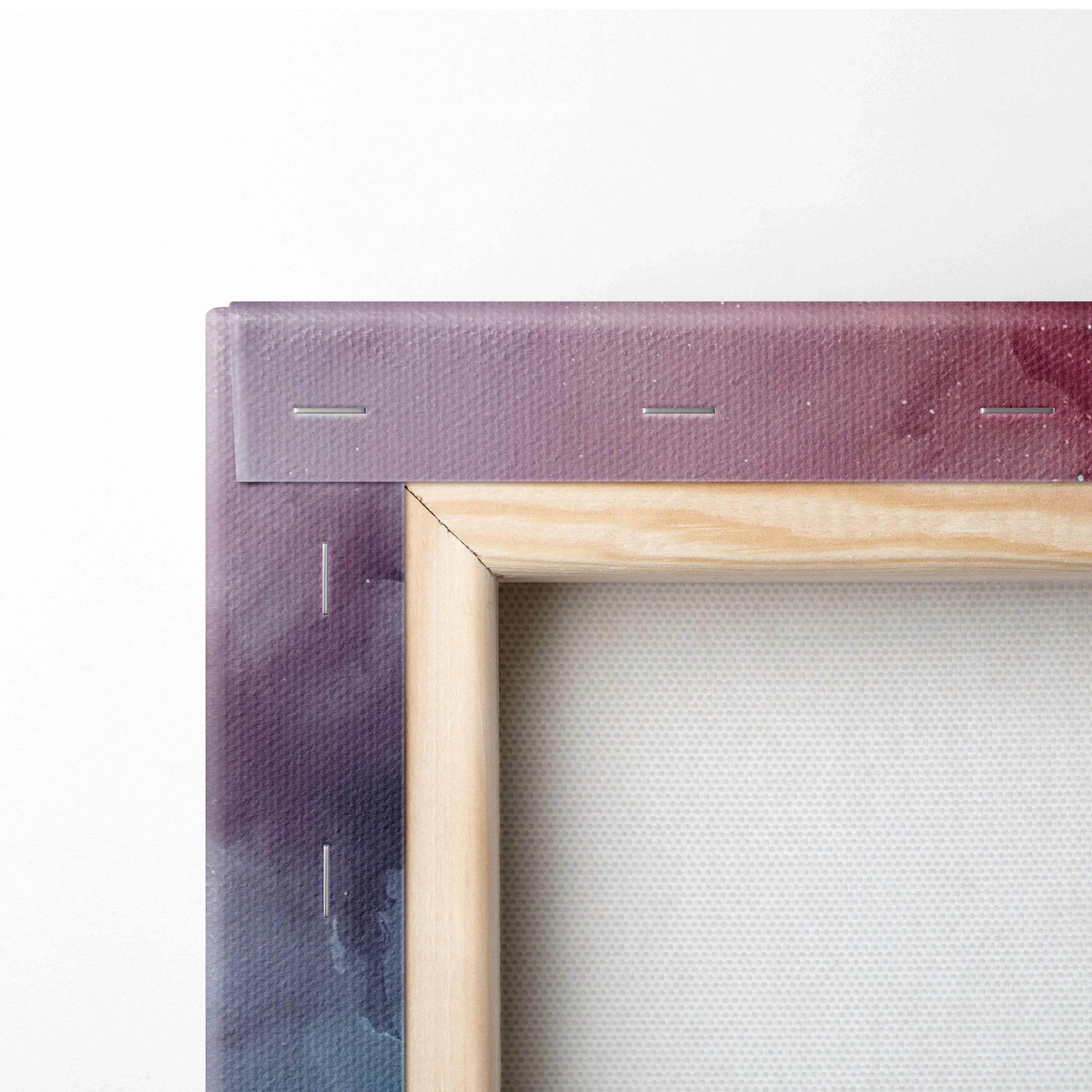 Close-up of wooden frame corner with stapled modern abstract digital art canvas print on white gallery wrap backing.