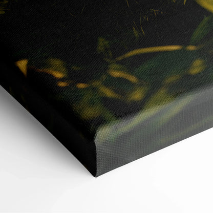 Close-up of black-edged canvas wall art with nature-inspired forest and sunset design decor.