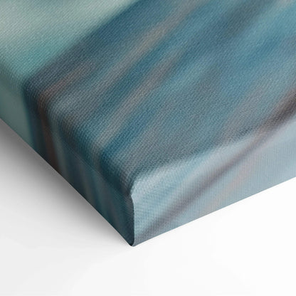 Close-up of textured canvas wall art with soft blue and green gradient brushstrokes.