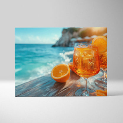 Canvas wall art featuring bright orange Aperol cocktails with ice and orange slices by ocean backdrop.