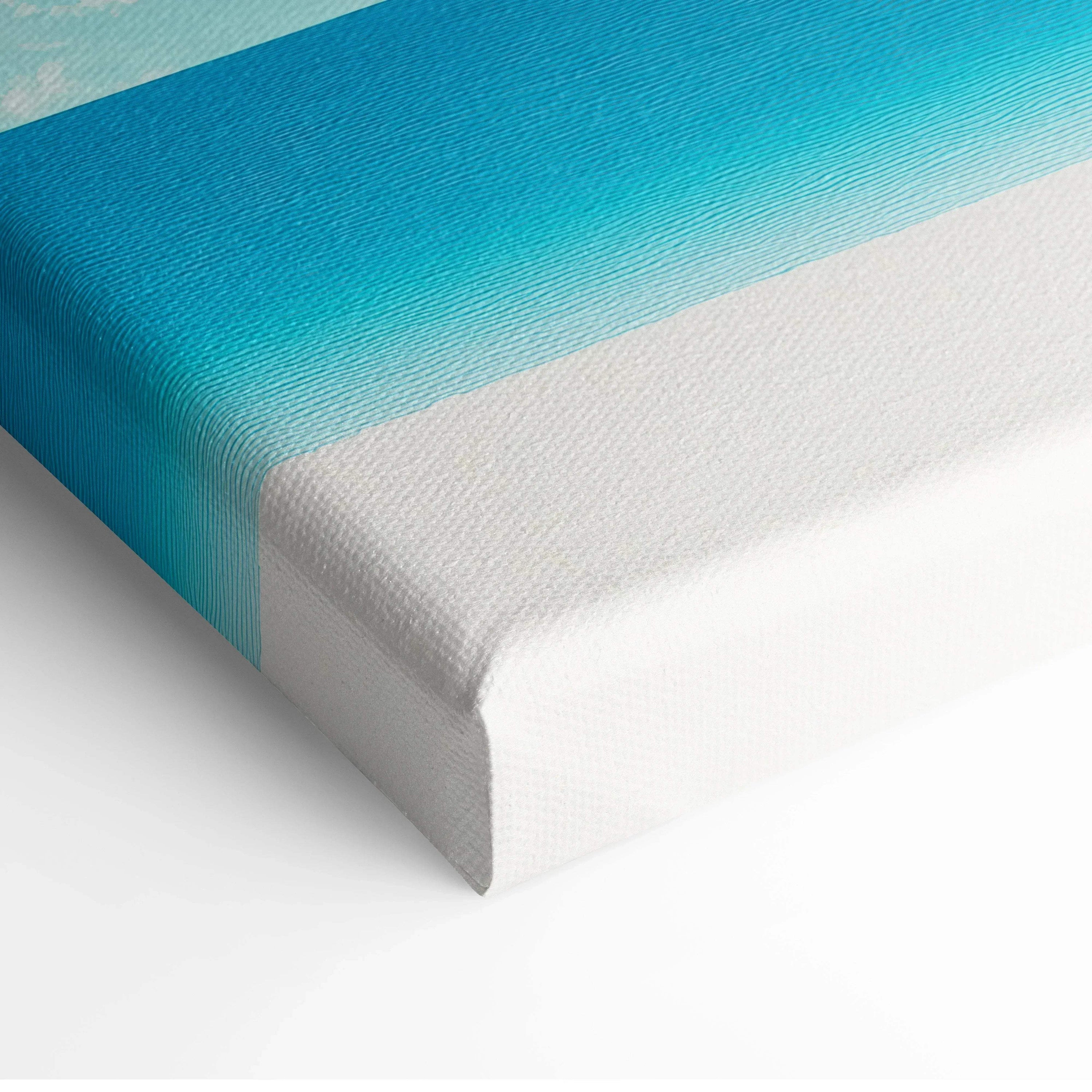 Close-up of canvas wall art with a gradient of blue tones blending into white, textured surface.
