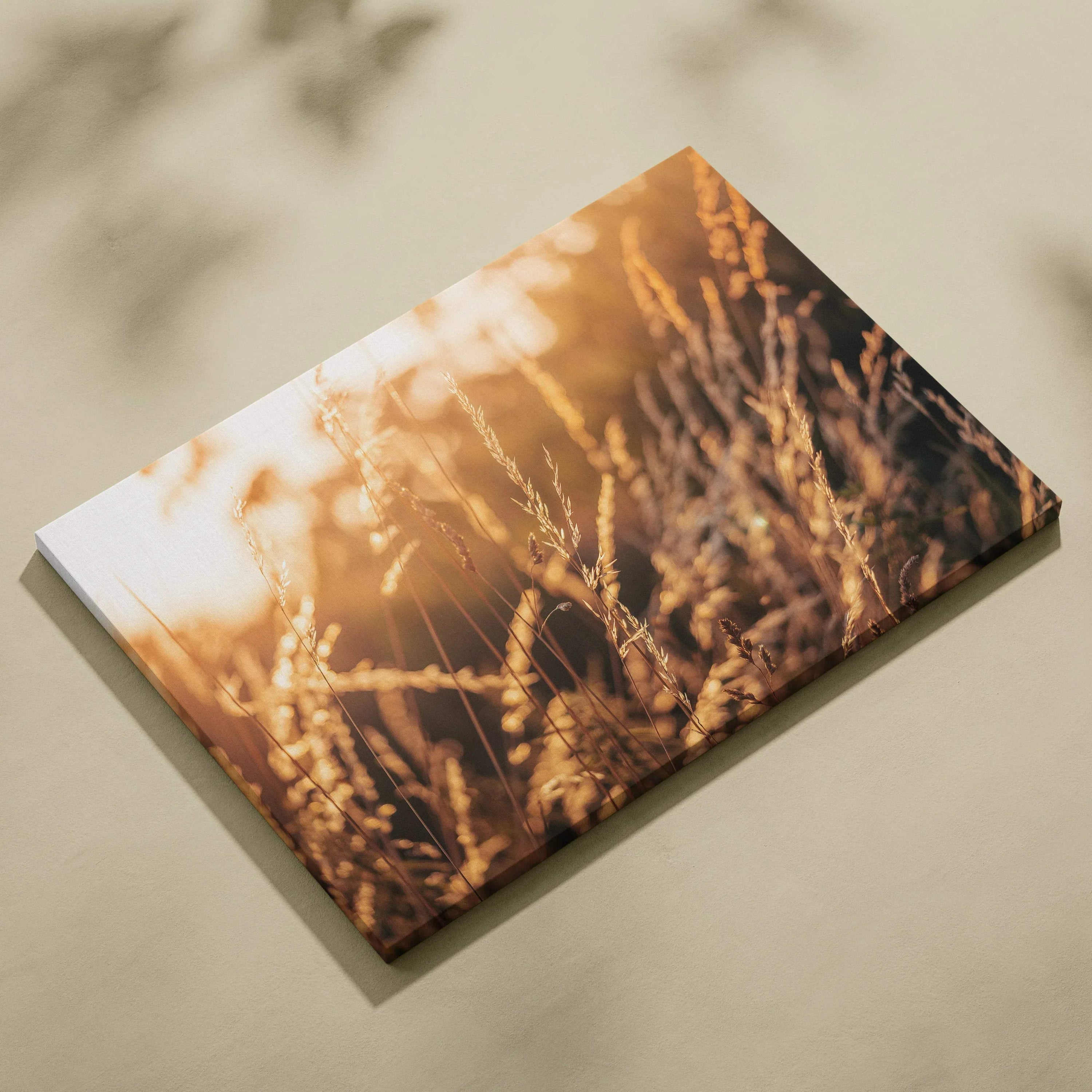 Canvas wall art featuring high-resolution close-up of golden summer grass and wildflowers in warm sunlight.