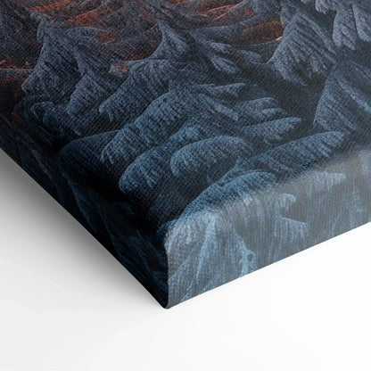 Canvas wall art featuring a high-resolution snowy mountain range at sunset with deep blue and orange hues.