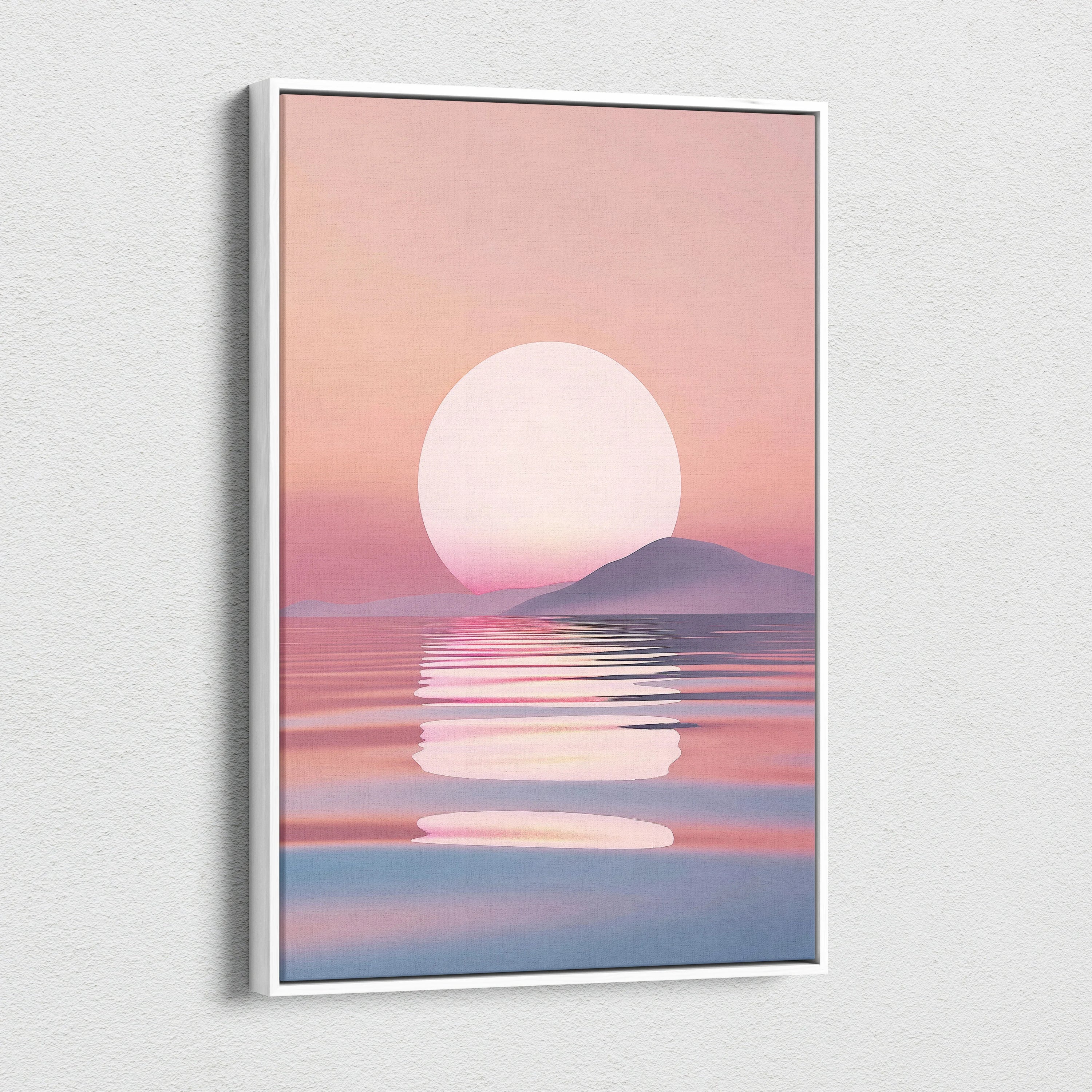 Minimalist canvas wall art featuring a large white sun setting over pink and purple sea waves with distant hills under a.