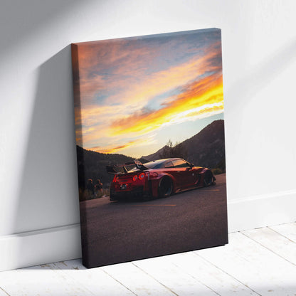Nissan R35 GTR parked on road at sunset with mountains backdrop vertical canvas wall art.