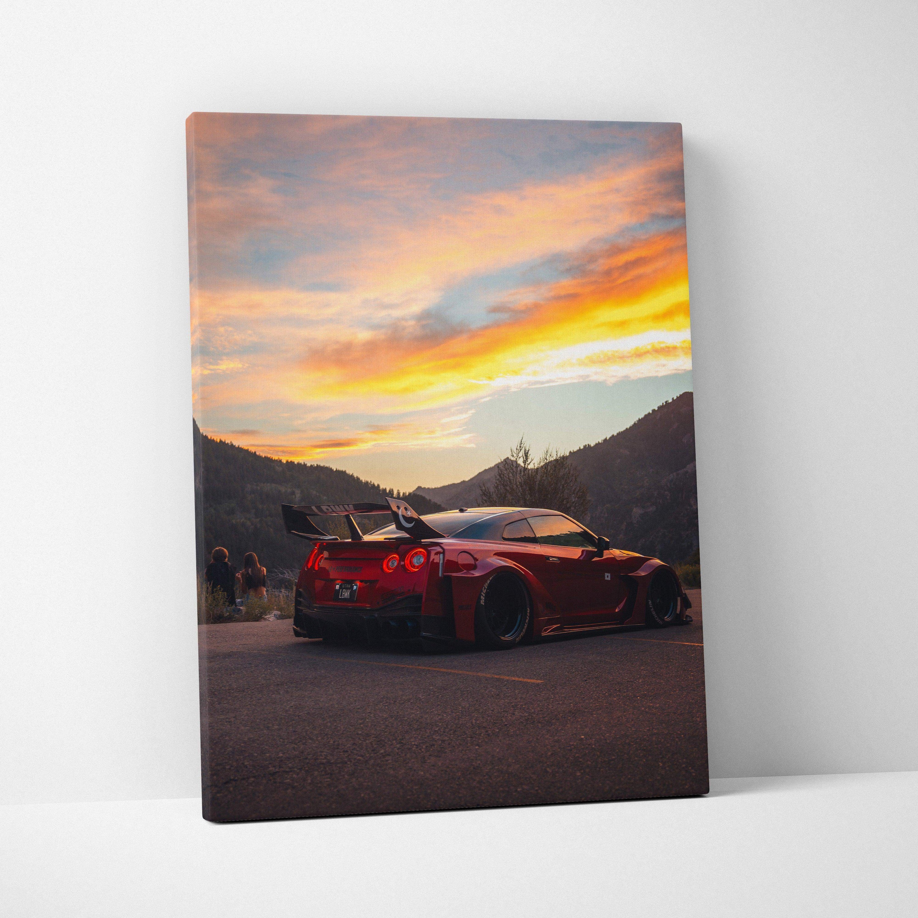 Nissan R35 GTR sports car at sunset on vertical canvas wall art with mountain background.