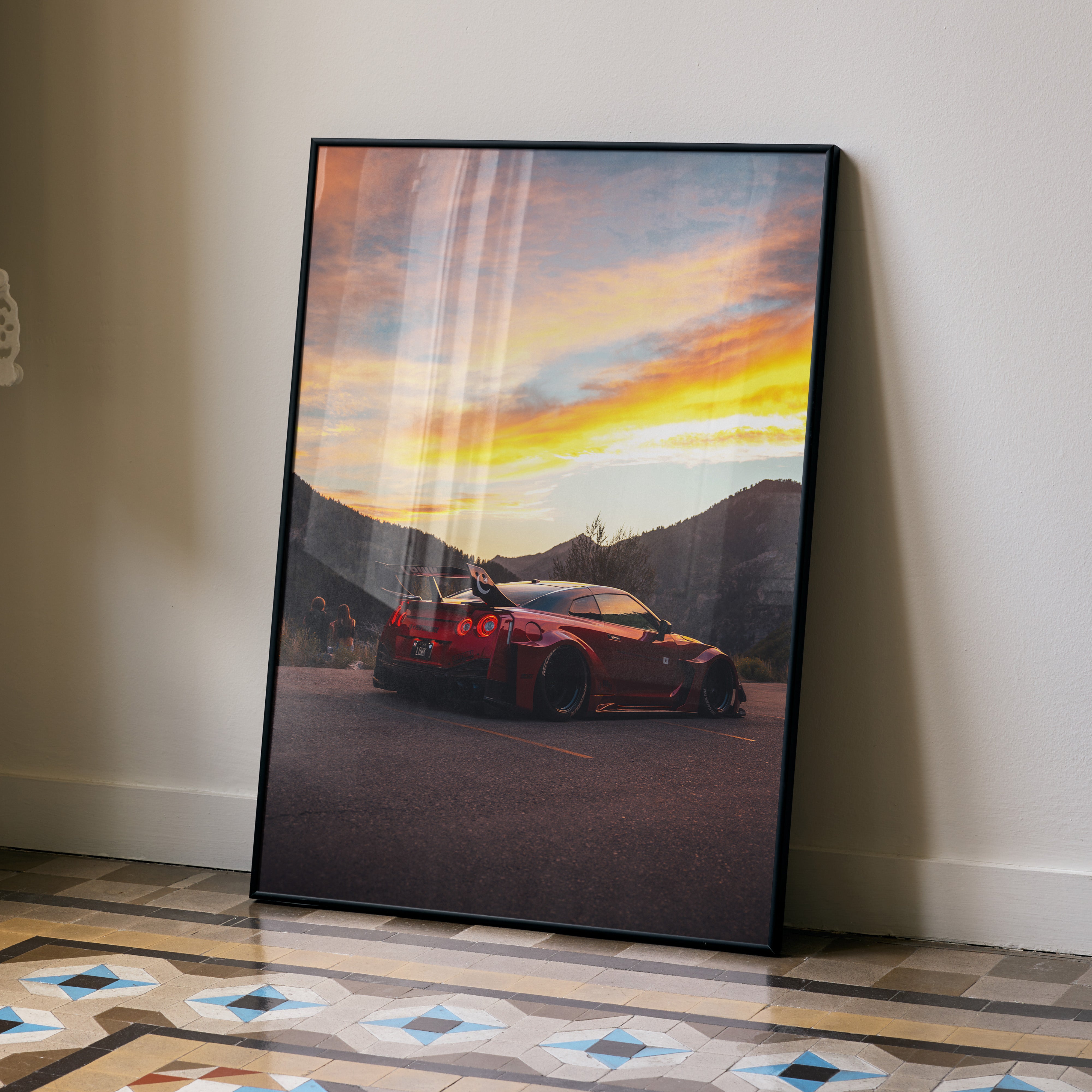 Nissan GTR R35 widebody parked at sunset with mountain backdrop poster wall art.