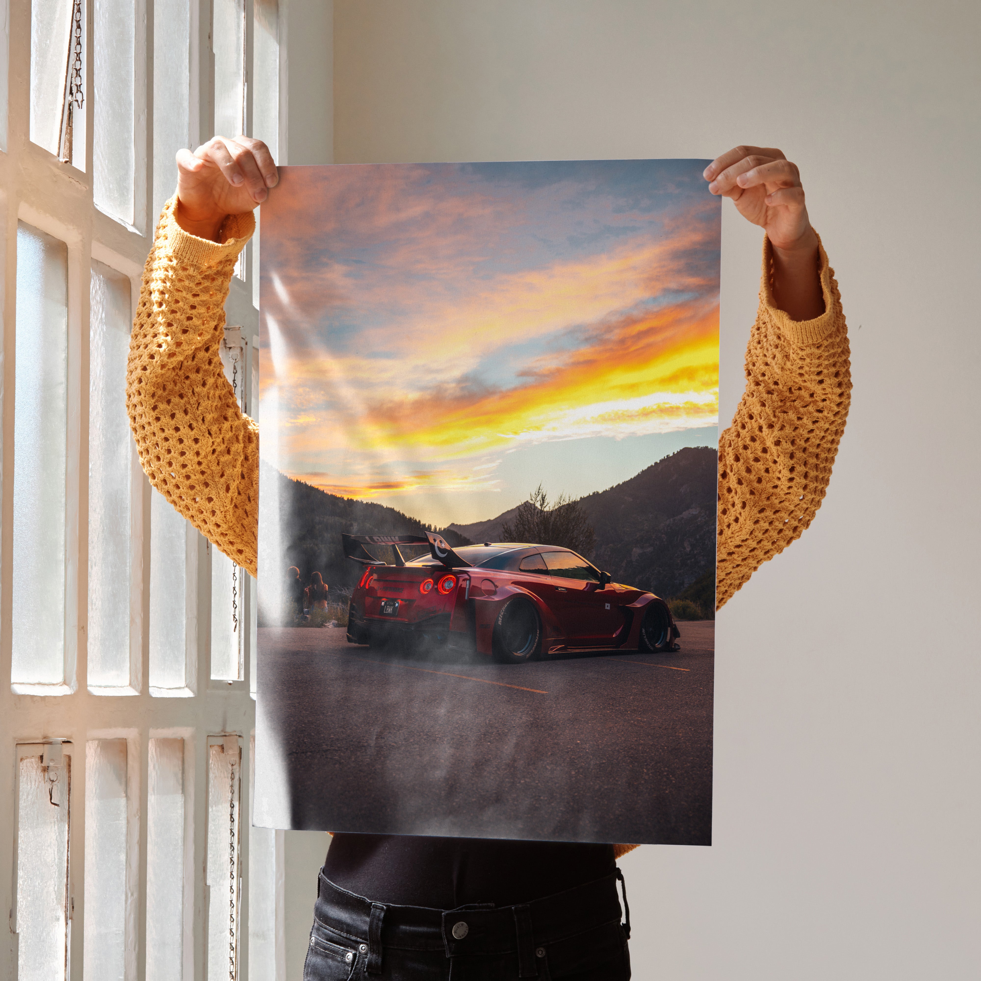 Nissan GTR R35 widebody parked on road at sunset poster wall art with mountains background.