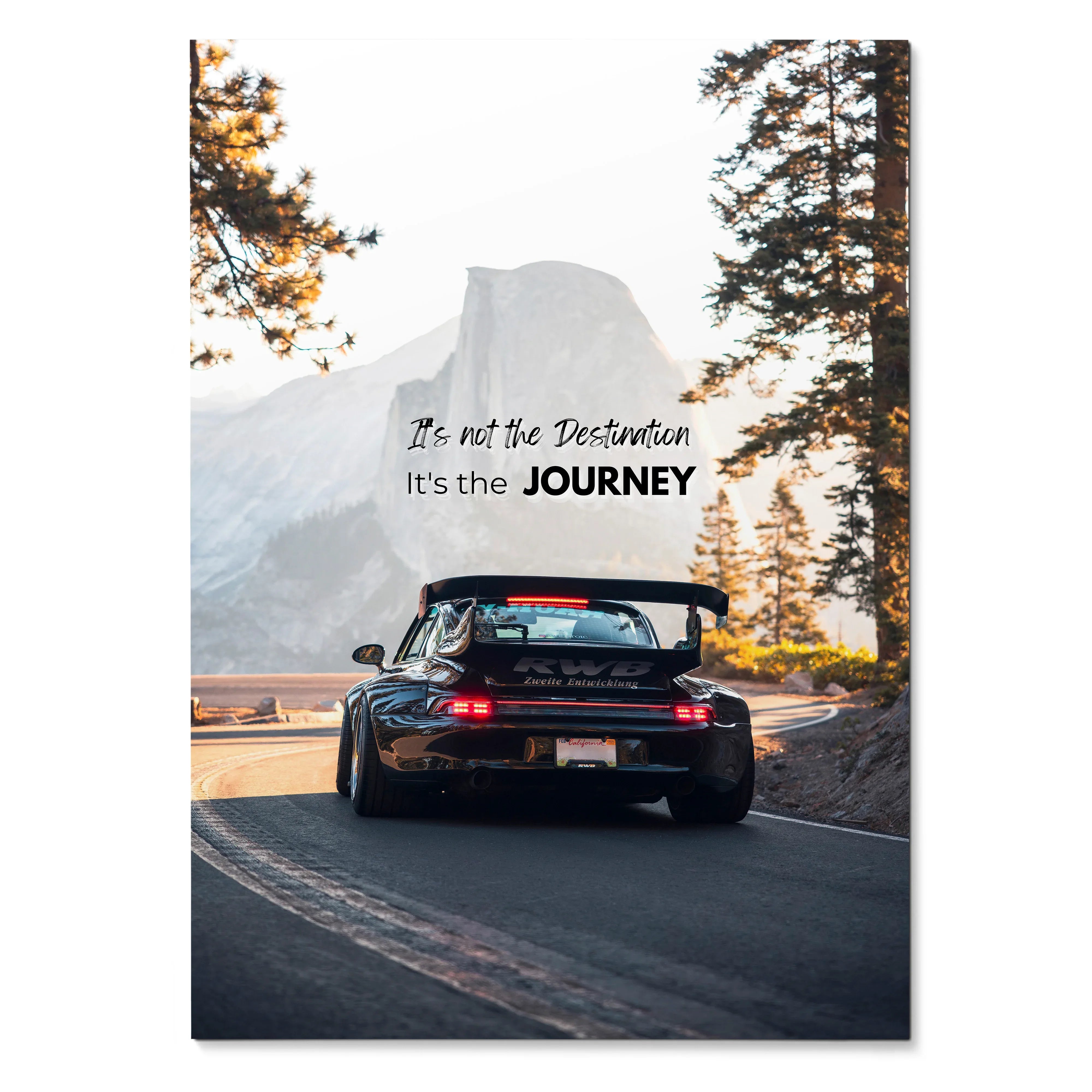 Poster wall art featuring a black RWB Porsche 911 driving on a mountain road with inspiring text overlay.