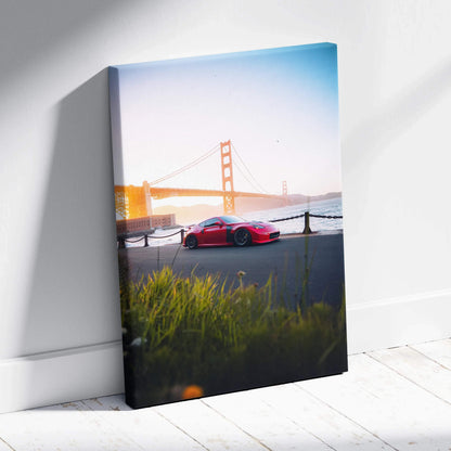 Red Nissan 370z parked near Golden Gate Bridge at sunrise on vertical canvas wall art.