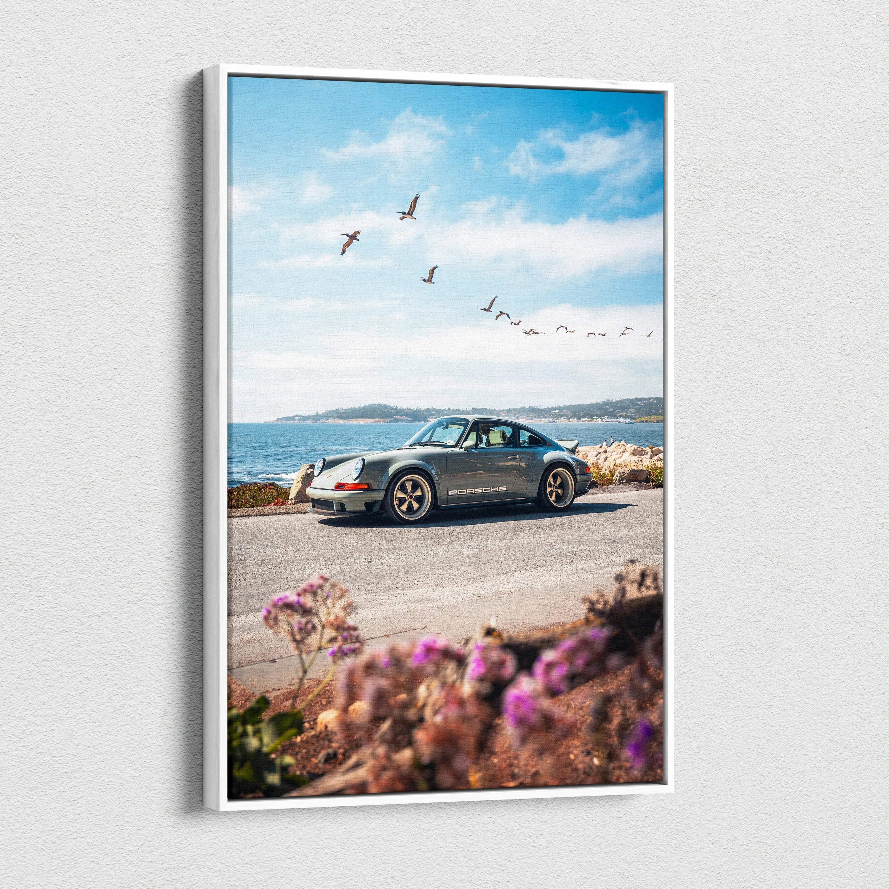 Porsche 911 classic car on coastal road with blue sky canvas wall art vertical print.