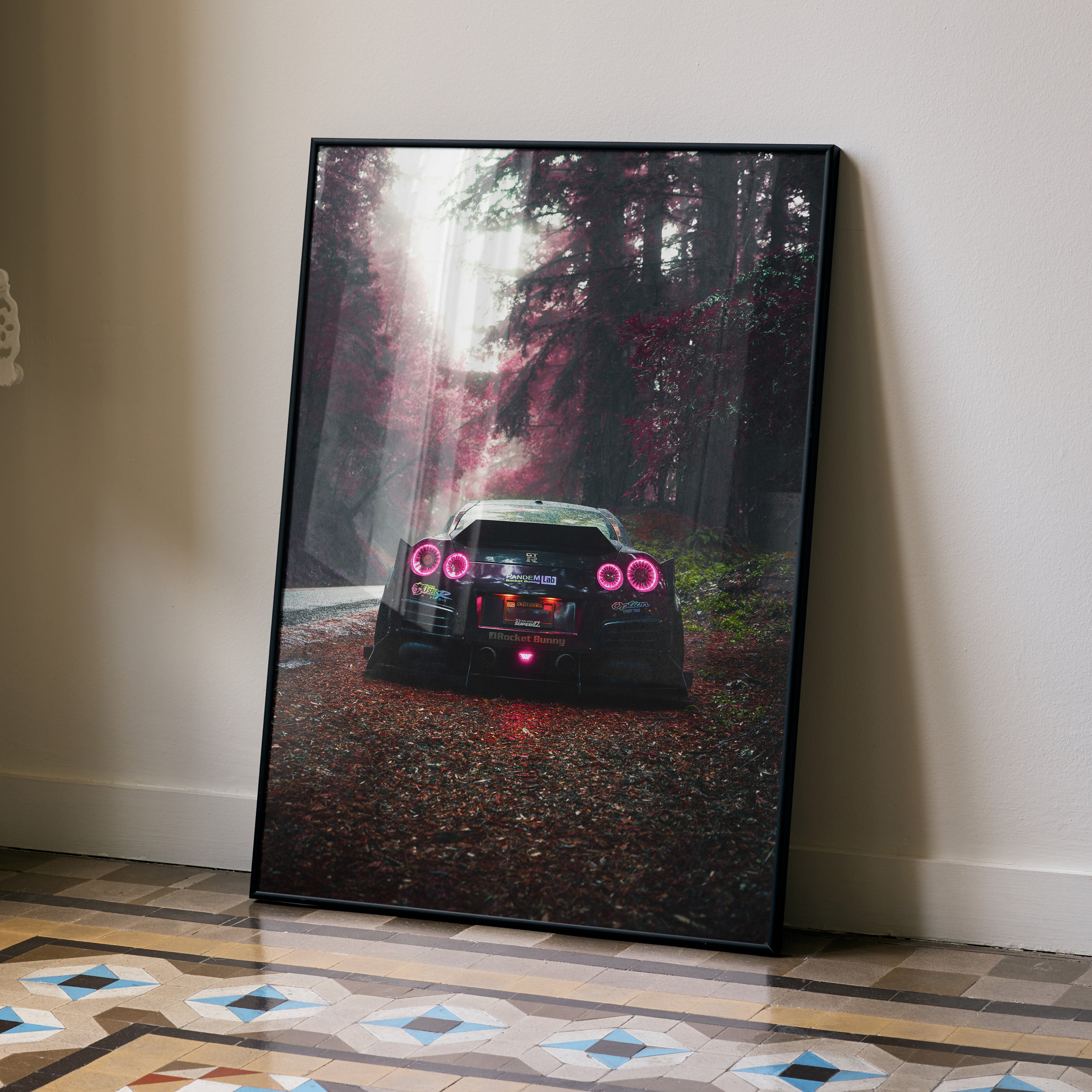 Nissan GTR R35 widebody poster wall art showing car rear with glowing taillights on forest road.
