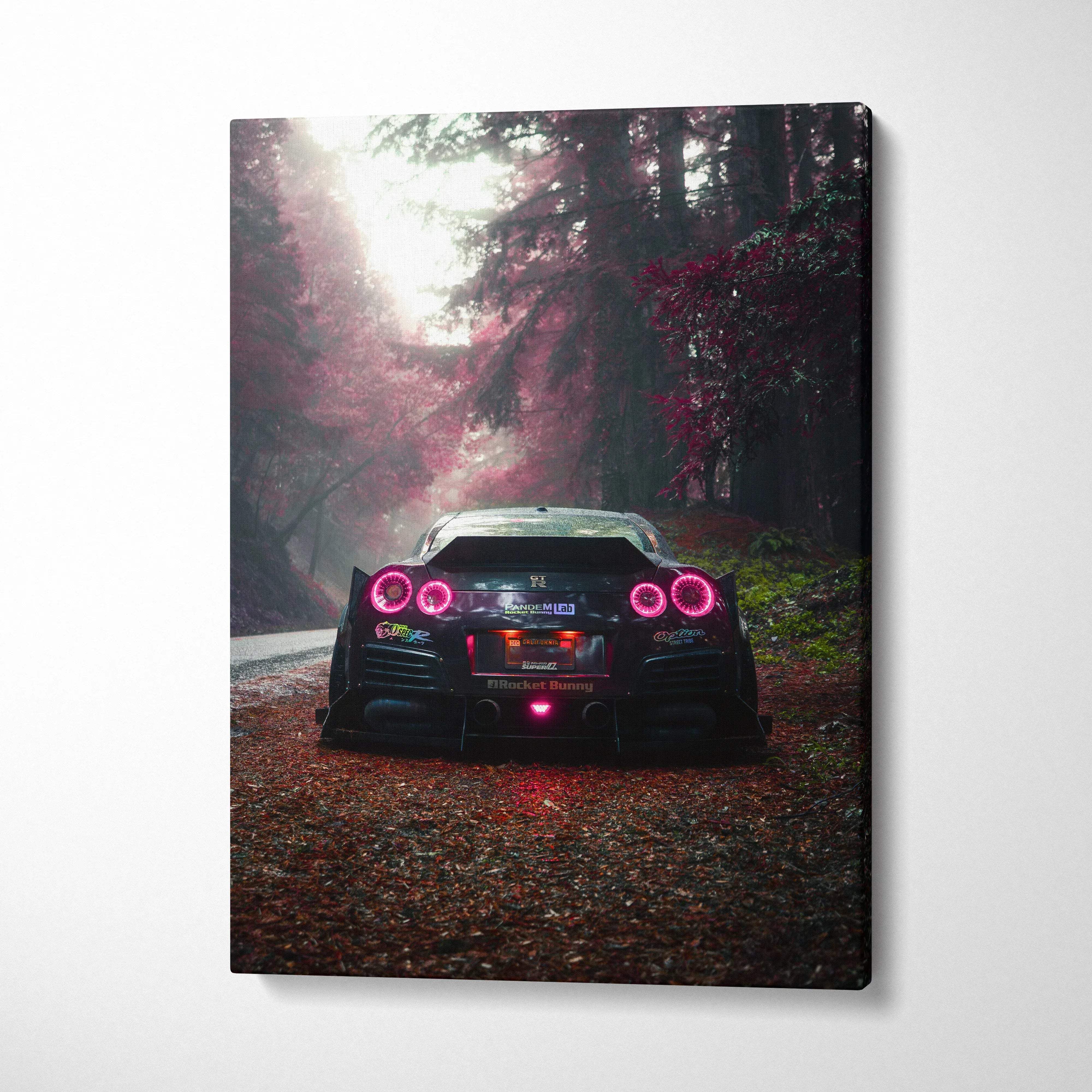Nissan R35 GTR rear view with glowing taillights in forest setting vertical canvas wall art.